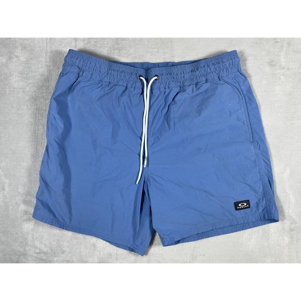 Oakley Swim Trunks Men Medium Blue Board Shorts Mesh Lined Beach Surf Logo